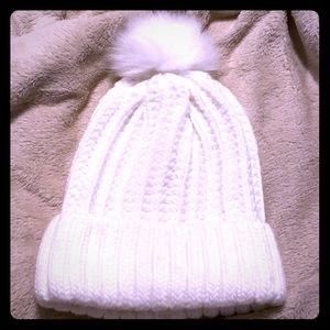 White fur puff hat